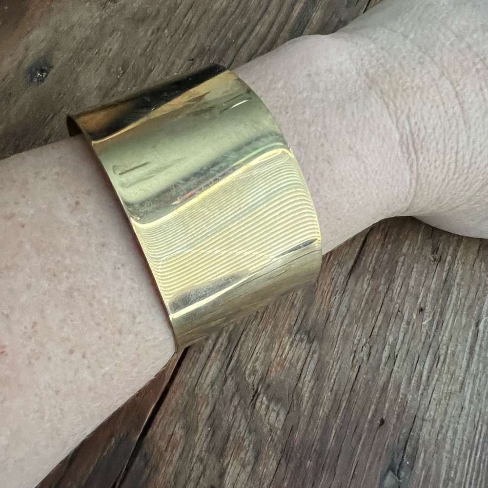Brass cuff bracelet.  Adjustable with chain.